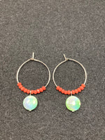 Hoop earrings with green mother-of-pearl beads and stainless steel