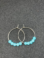 Hoop earrings with aquamarine glass beads and stainless steel