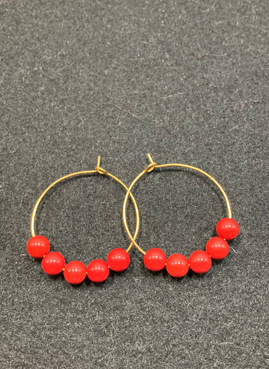 Hoop earrings with red coral beads and gold stainless steel