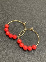 Hoop earrings with red coral beads and gold stainless steel