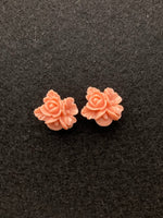 Ear studs with a pink flower