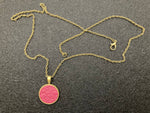 Necklace with ostrich leather pendant